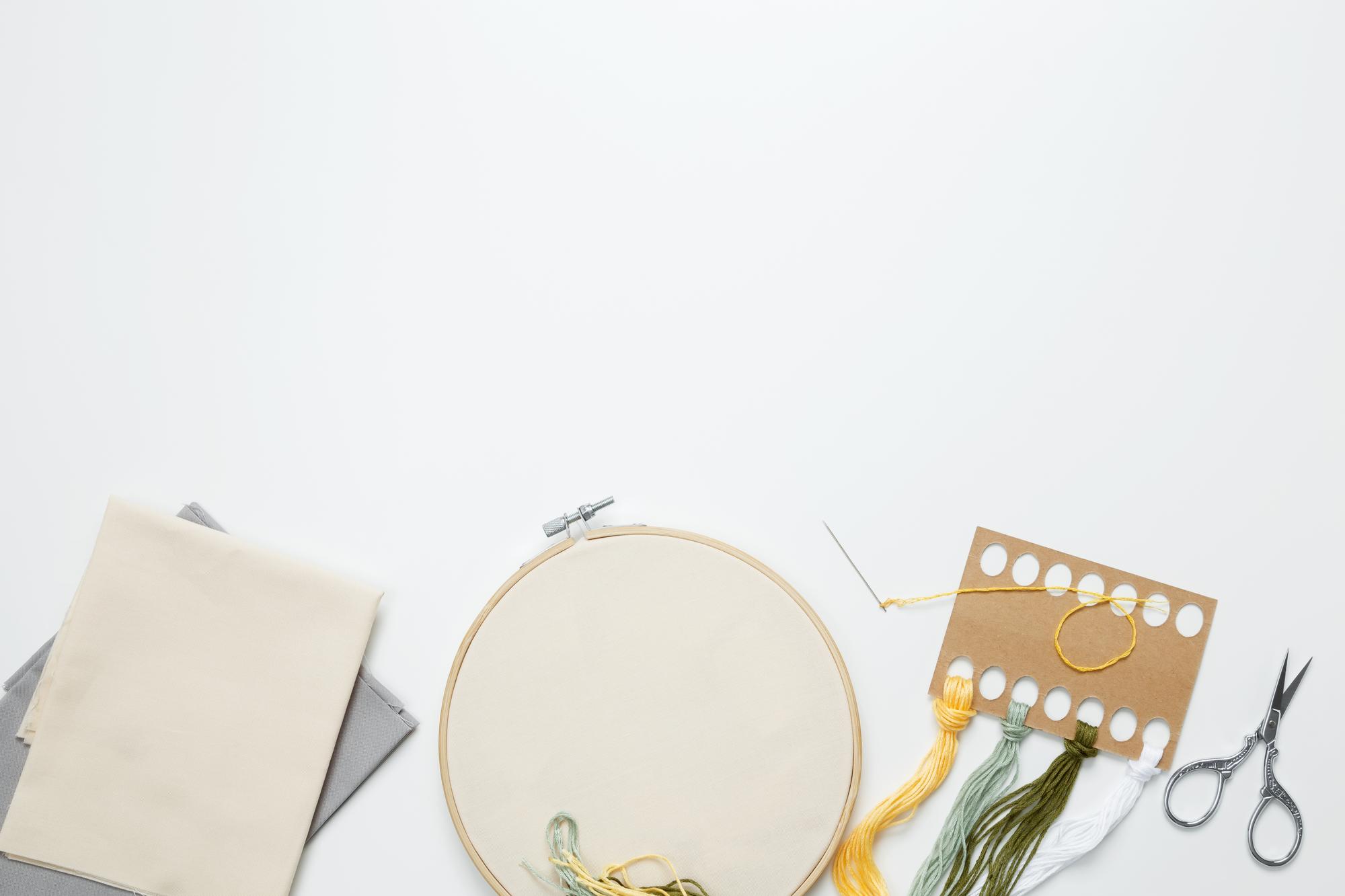 Studio table with hoop and fabric in natural light